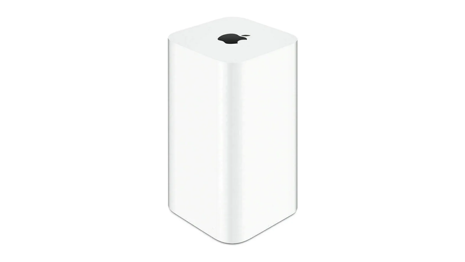 Apple AirPort Time Capsule beside a Mac used for Time Machine backups
