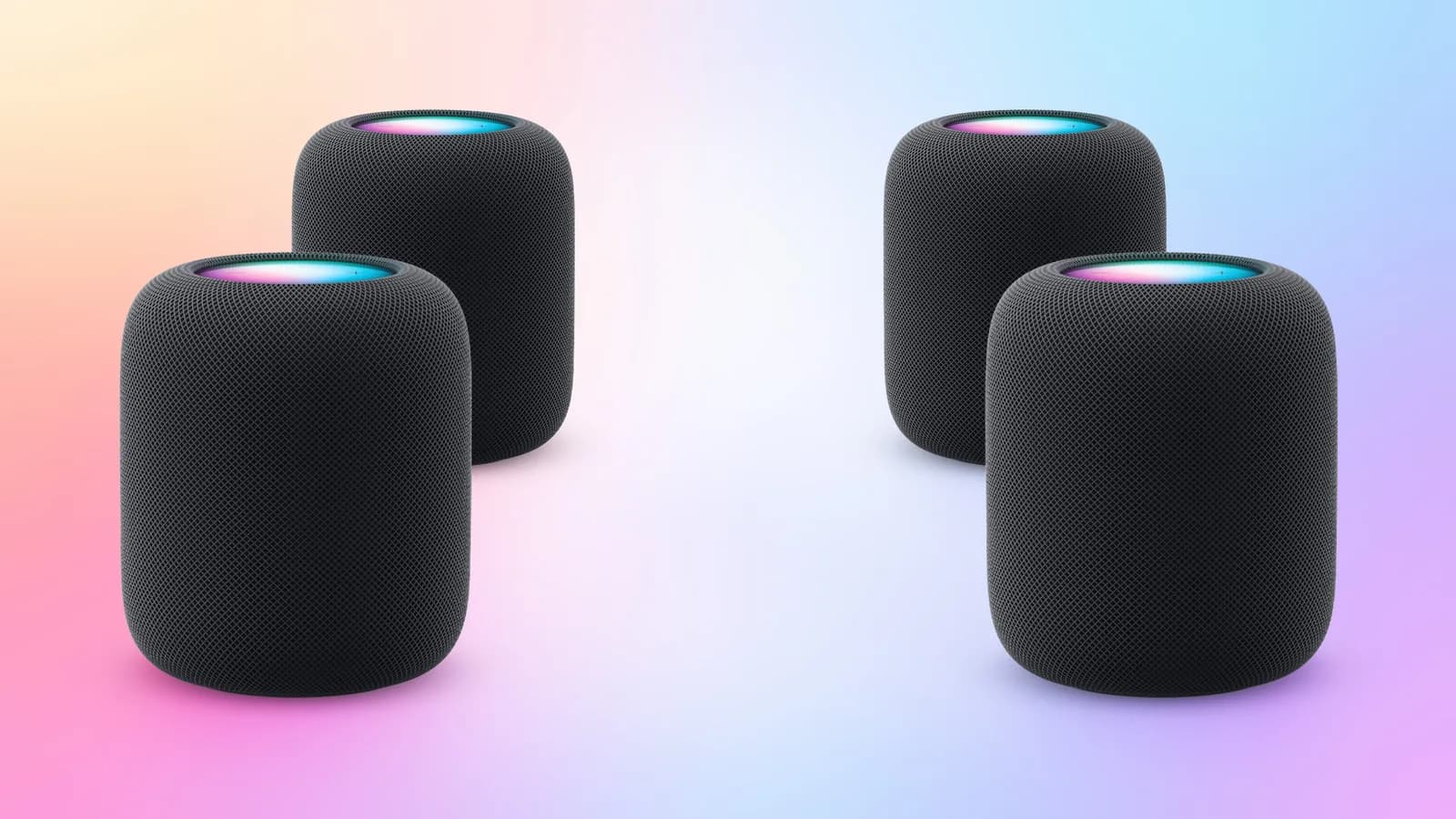 Apple TV 4K рядом с колонками HomePod, расположенными для системы объёмного звука