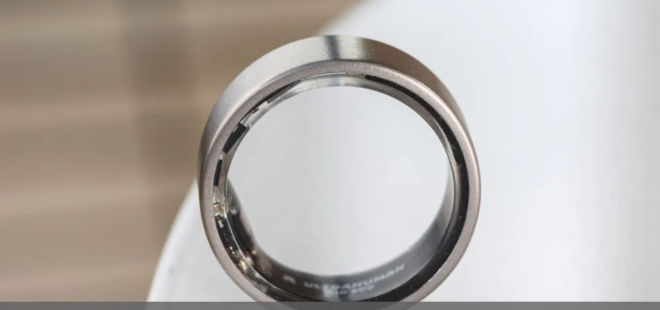 Ultrahuman Ring Air bredvid appens resultatskärm för Heart Scan