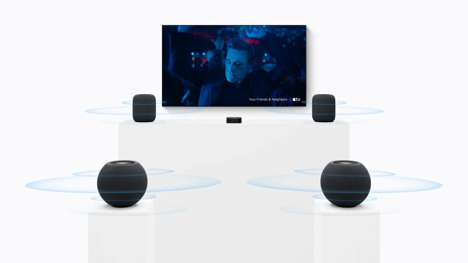 New Apple TV 4K with HomePod speakers arranged for a surround sound setup