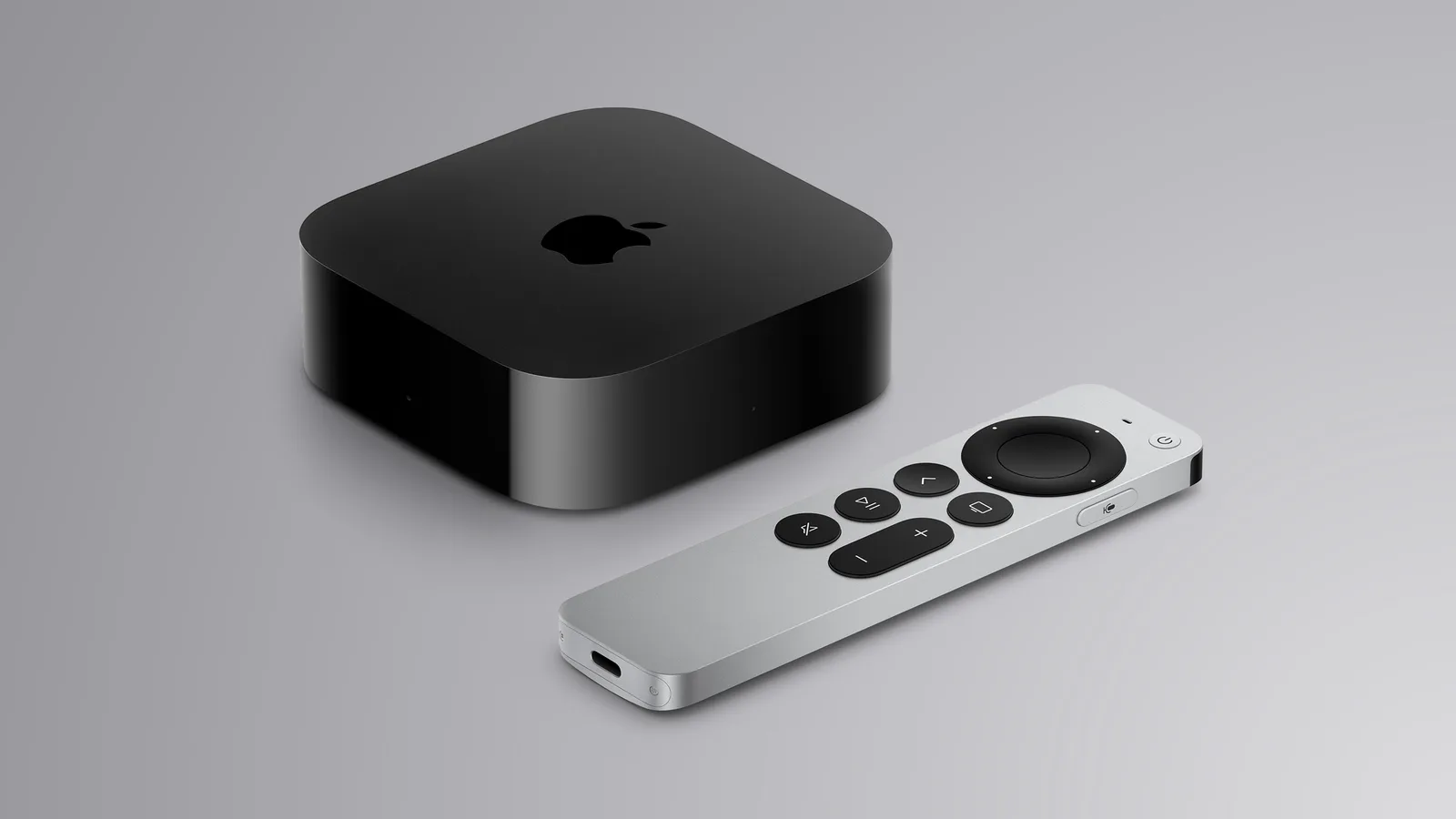 Apple TV 4K рядом с парой колонок HomePod mini